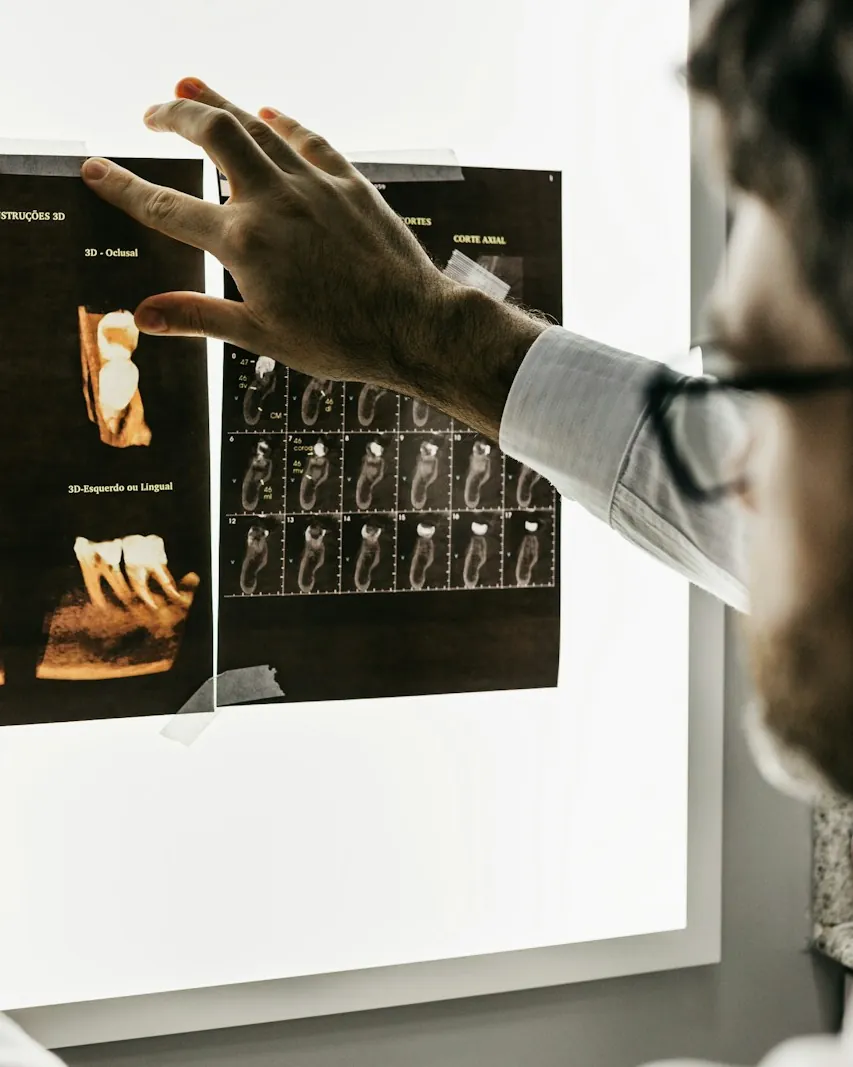 The doctor studying X-rays